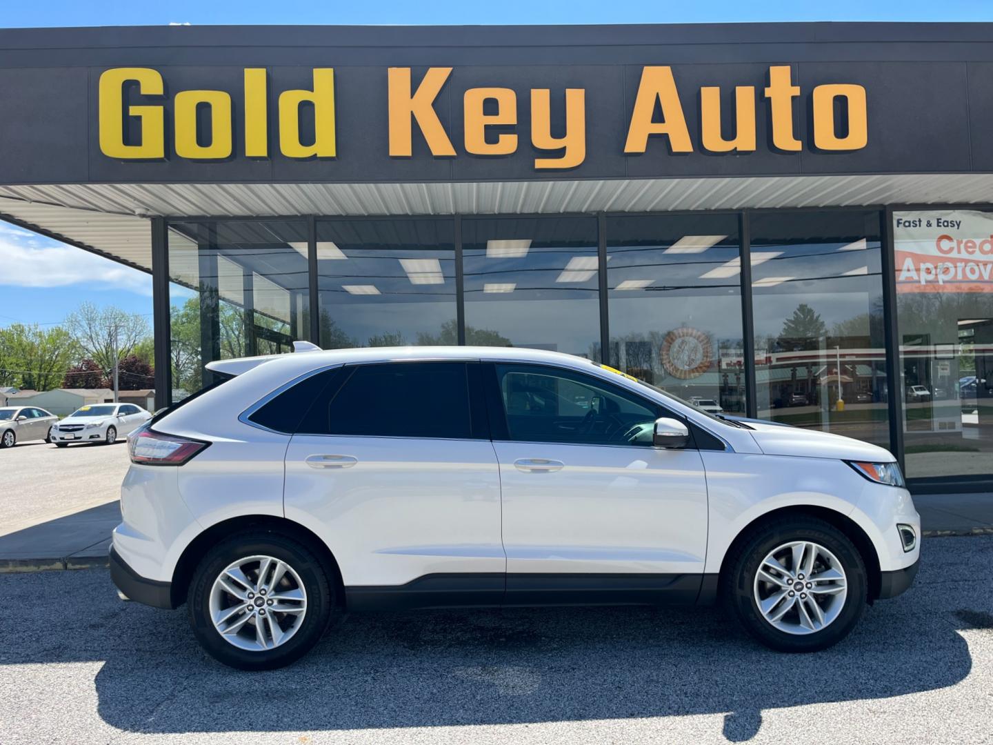 2015 Oxford White Ford Edge SEL FWD (2FMTK3J91FB) with an 2.0L L4 DOHC 16V engine, 6-Speed Automatic transmission, located at 1633 W Kimberly, Davenport, IA, 52806, (563) 323-5341, 41.559456, -90.598732 - Photo#0